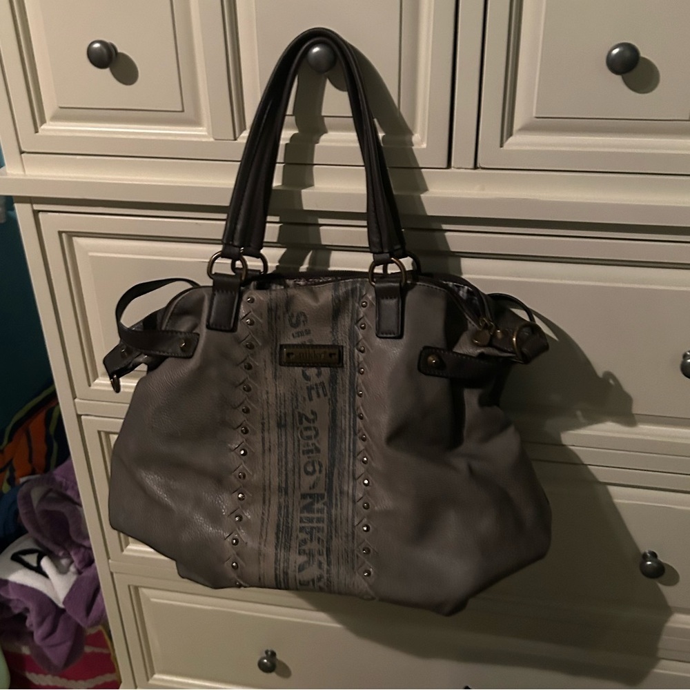 Nikki black leather handbag with blue detailing
